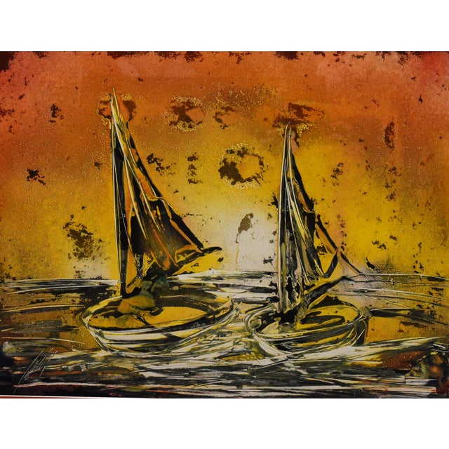This art print, sized 24" x 20", captures a serene scene of two sailboats navigating calm waters under a vibrant sunset....