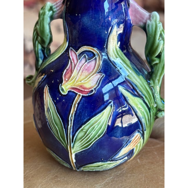 Antique French majolica ceramic vase in the most beautiful, vibrant colors! The flower motif is a cyclamen- you often see...