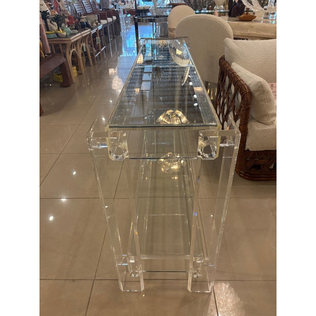 Vintage Modern 1970s lucite peg console, entry way table, two tier glass tops. Glass tops are new. Dimensions: 60 L x 15 D...
