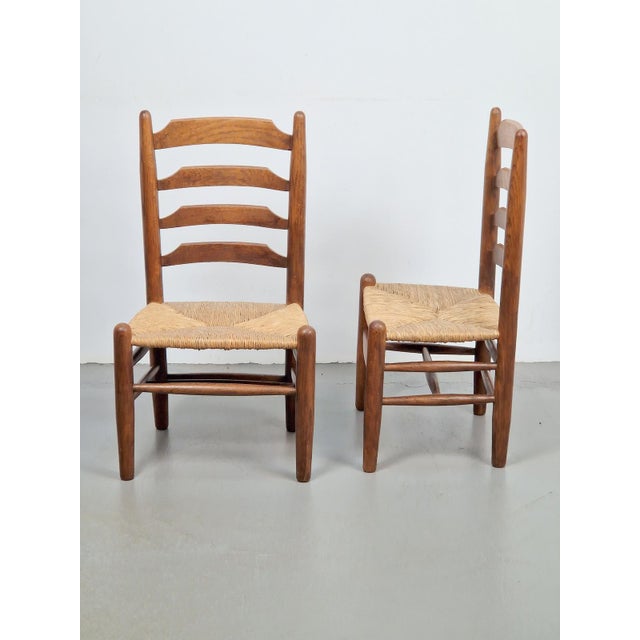 Set of 2 vintage brutalist Charlotte Perriand style wood wicker chair '60s Set of 2 French dining room chairs in Charlotte...