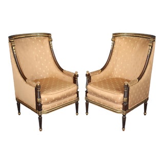 Pair Louis XVI Style Carved With Gilt Accent Wing Back Bergère Chairs For Sale