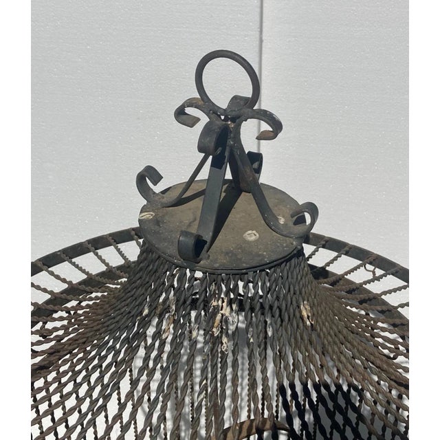 Here's a stylin' bird cage for the garden or home (depending whether you want it for a bird or just something cool to have...