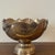 A French Art Nouveau silverplate champagne cooler featuring a scalloped edge, decorative floral detailing, and a classic...