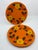 Vintage 1960-1970s era ceramic scalloped dinner plates. Bright orange plates with yellow and orange florals. The plates...