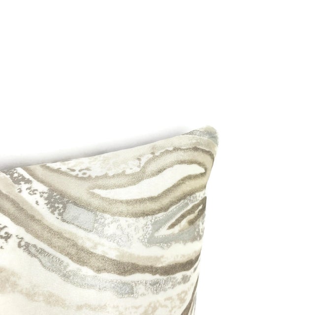From Holly Hunt's Great Plains Collection is Marbled in the colorway Terrazzo. This pillow is printed on white velvet...