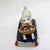 Fantastic Victorian-era Staffordshire porcelain confetti poodle holding a basket of apples in its mouth. This dog is...