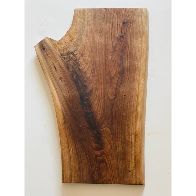 Solid walnut wood live edge large cutting board or charcuterie board. Not used.