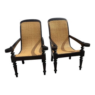Mid 20th Century Dutch Colonial Indonesian Cane and Wood Plantation Chairs With Extending Arms For Sale