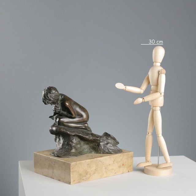 Fisherman, a bronze sculpture on a marble base by Vincenzo Gemito. The work is not signed by the artist. This piece is...