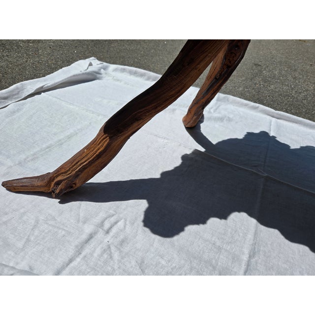 This is a very unique burled walnut table with sculptural legs that really make a statement. It can also be used as bench...