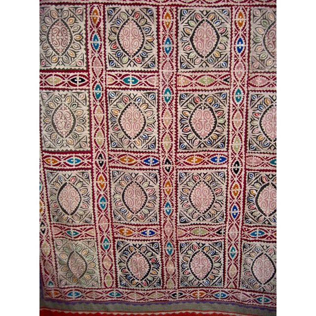 This beautiful piece present a geometric design , done out of applique pieces and playing with shape and colors , it is...