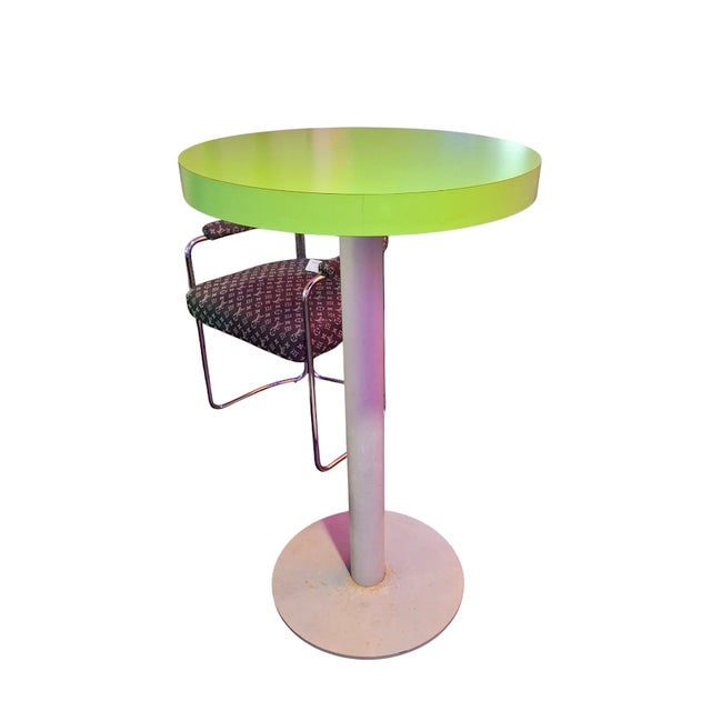 Add a touch of vintage charm to your space with our Green Bistro Table. This fun and playful bistro table features a light...