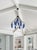 The Sara chandelier by Canopy Designs, is composed of two hanging metal rings adorned with milk glass shades. A stunning...
