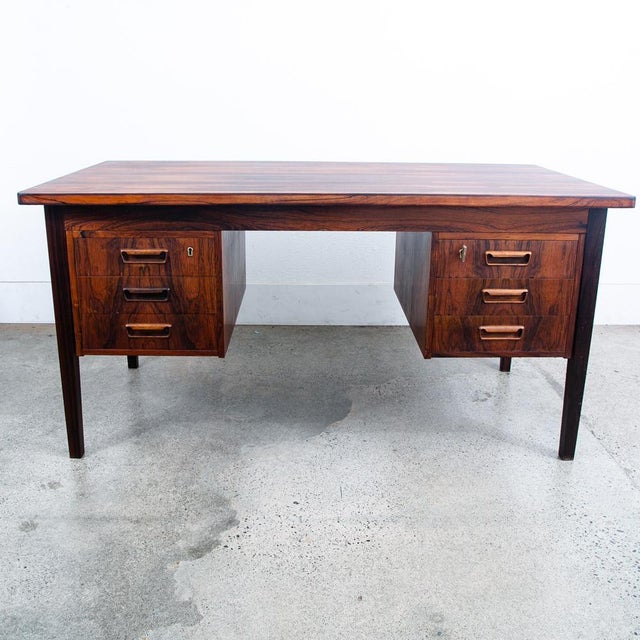 Fantastic Danish modern 6 drawer rosewood executive desk. Floating / fully finished design. There are three drawers on...