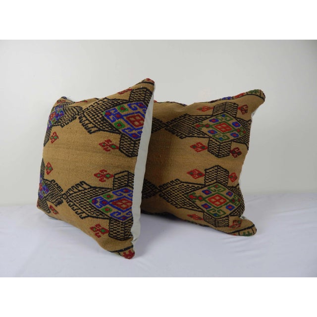 These beautiful 18" x 18" pillow covers were made from an authentic, vintage Turkish rug handwoven in the 1960s. Bright...