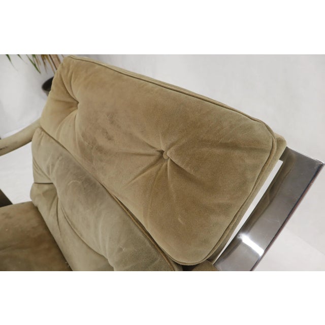 Mid-Century Modern suede upholstery very heavy and thick gage stainless steel base lounge chair.
