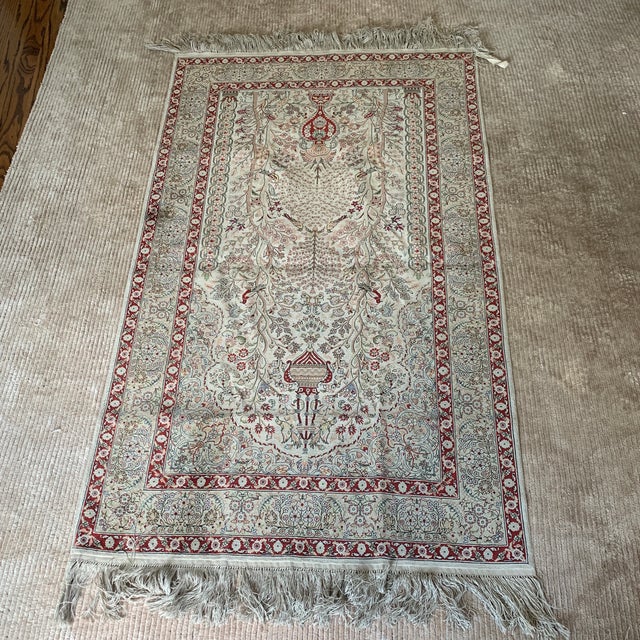 Fine hand knotted Chinese Persian style silk carpet. Lovely shades of celadon green and deep red. Directional pile and...