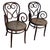Pair ofVictorian Thonet number 04 armchairs each features an elegant, sculptural frame crafted from warm-toned bentwood...