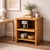 Late 20th-century solid oak media cabinet with a pull-out shelf and compact architectural form. Built in warm, honey-toned...