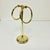 A fabulous vintage brass finish Hollywood Regency countertop freestanding Hand Towel Stand. It features two rings that can...