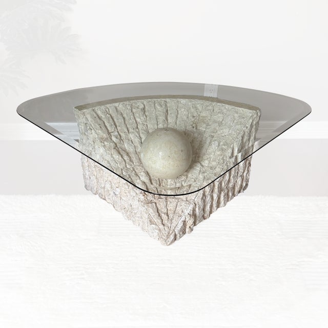 Gorgeous mactan stone table by Magnussen Ponte in the 1980s, designed with a luxurious, postmodern feel. The warm white...