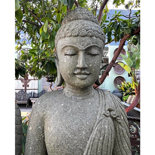 Vintage standing stone carved Buddha statue. Wonderful for outdoor or indoor display. Peaceful expression with hands...