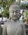 Vintage standing stone carved Buddha statue. Wonderful for outdoor or indoor display. Peaceful expression with hands...