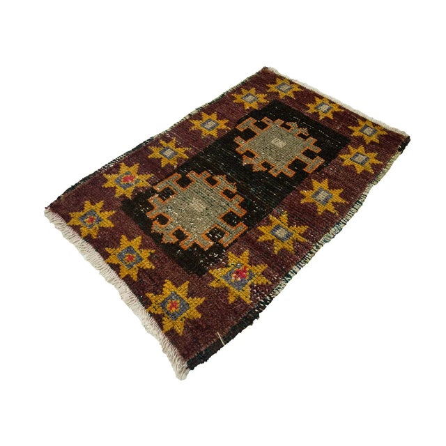 Vintage Handknotted decorative mini rug from Kars region of Turkey. Approximately 45-55 years old. In very good condition.