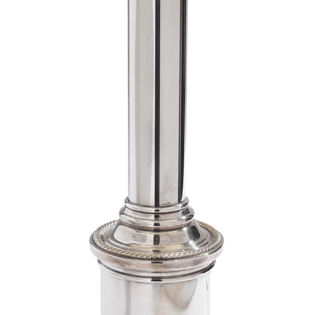 An English silver-plated table lamp from the 1850s, built as a Doric column on a gadrooned drum plinth over a stepped...