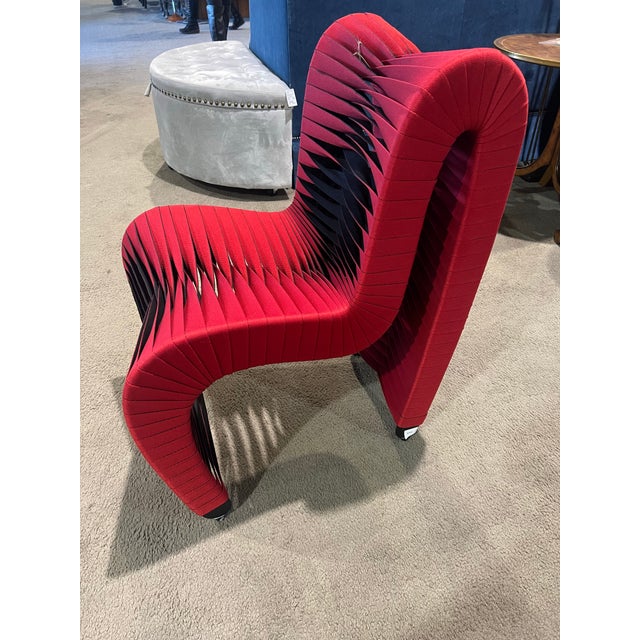 Striking and sculptural, this Phillips Collection Seat Belt Chair is a bold statement piece that blurs the line between...