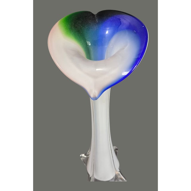 This vintage hand-blown art glass bud vase features a unique Jack-in-The-Pulpit design in shades of blue, green, and...