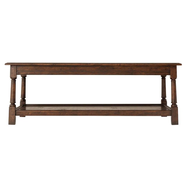 A 17th-century style mahogany and reclaimed oak occasional 'Joynt' cocktail table, the planked rectangular top with a...