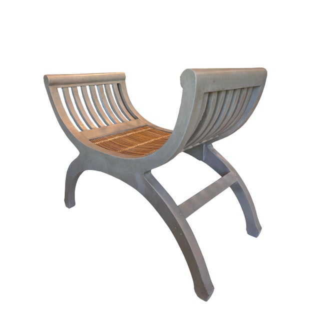 A stunning bench featuring a woven bamboo seat and a custom finish, exemplifying the perfect blend of artistry and...