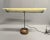 A mid-century Mobilite gooseneck desk lamp with fluorescent light and adjustable stem. The vintage office light has a...