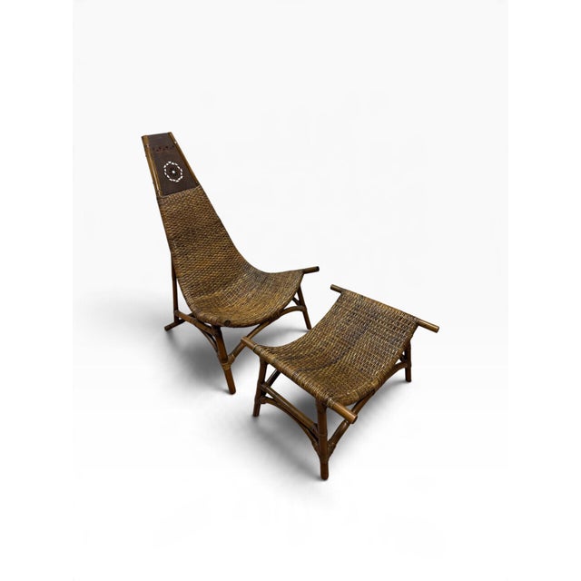 Elevate your space with this stunning mid-century modern high-back lounge chair and matching curved footstool set....