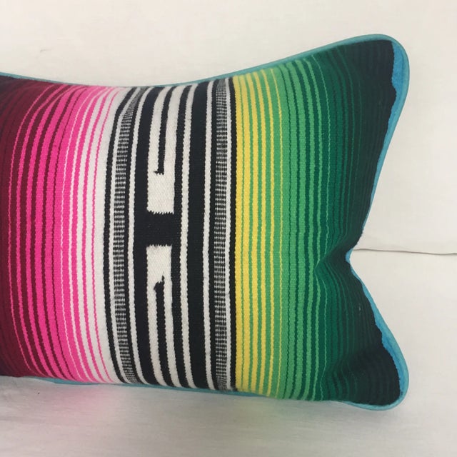Custom made in Los Angeles from a vintage serape blanket. Aqua piping, zipper closure. Luxury down blend fill included....