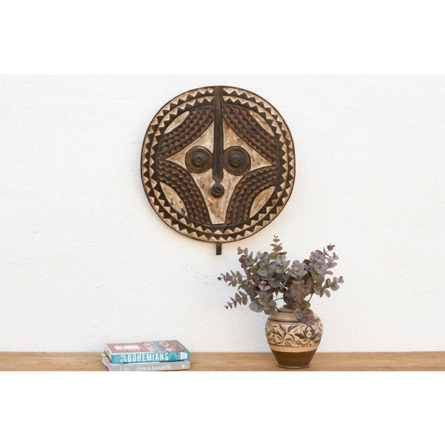 This lovely vintage Bobo sun mask is a must-have for collectors and enthusiasts of tribal culture. Hand-carved from wood...