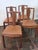 A wonderful hand made hand carved set 4 walnut French Art Deco Dining Chairs with Asian Motifs. Art Deco meets Chinese...