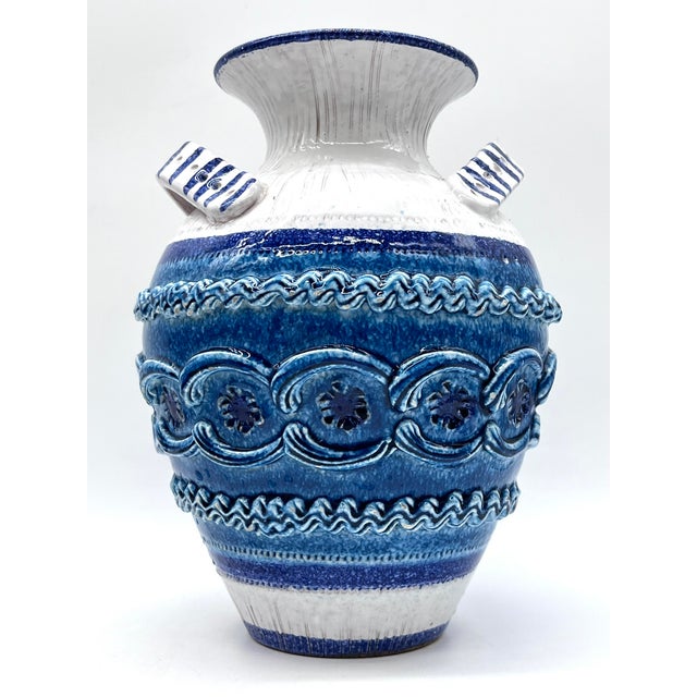 Decorative amphora vase from the Bitossi manufactory. The vase captivates with its striking blue and white color scheme...