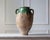 This 19th-century terracotta jar originates from the Balkan Peninsula, a region celebrated for its centuries-old ceramic...