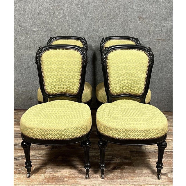Set of four napoleon iii period chairs in black lacquered wood, circa 1850 seats and backs upholstered in beautiful, high-...