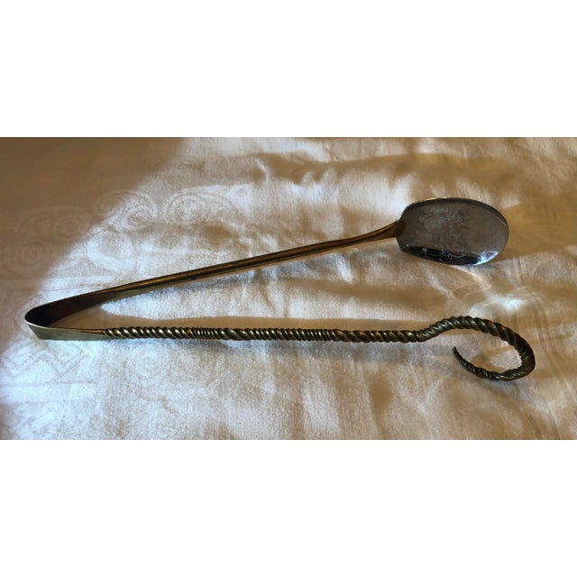 Art Nouveau serving tongs for pastry, cake, fish or meat. This serving piece is a beautiful design. Made of silver plated...