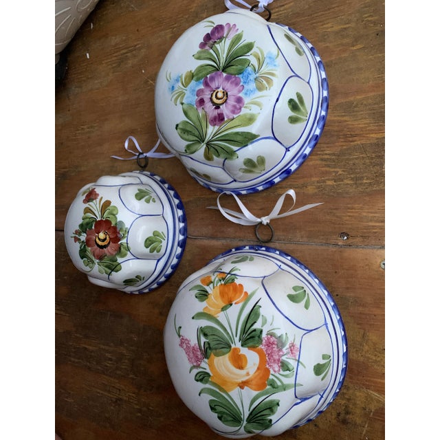 The Set of 3 graduated Ceramic molds. Made by ABC Bassano in Italy. (Fattoria) Kitchen Molds. They are meant to hang from...