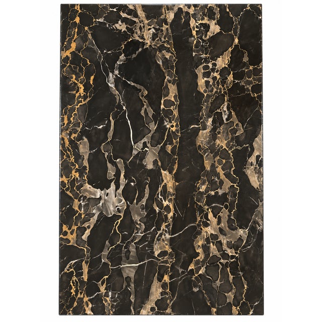 Carved Giltwood & Black Marble Console Table — An impressive statement console featuring a richly veined black marble top...