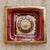 A 1970s French ceramic tray by Georges Pelletier. The square form is richly worked in deep crimson glaze, its surface...