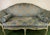 This Early Nineteenth Century Settee is a show stopper! The sensual lines of the carved frame is painted in a subtle...