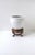 A white porcelain planter cachepot jardinière with wood stand, Blanc-de-Chin, circa mid to late-20th century. A white...