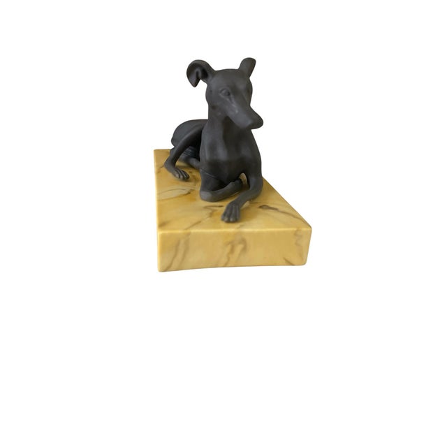 Gorgeous vintage Chelsea House Mount Royal Italian greyhound figure featuring a matte black porcelain dog atop a faux...