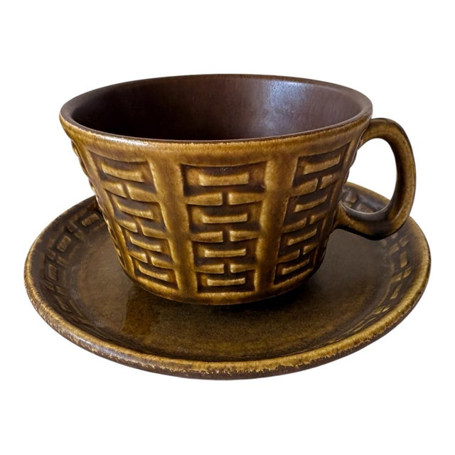 A striking set of three vintage Ceramano Epsilon cups with matching saucers, produced in West Germany during the 1960s....