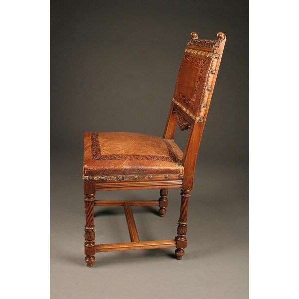 Set of 12 Antique Italian Renaissance Style Hand-Carved Walnut Dining Chairs With Embossed Leather, Circa 1890 For Sale - Image 4 of 5